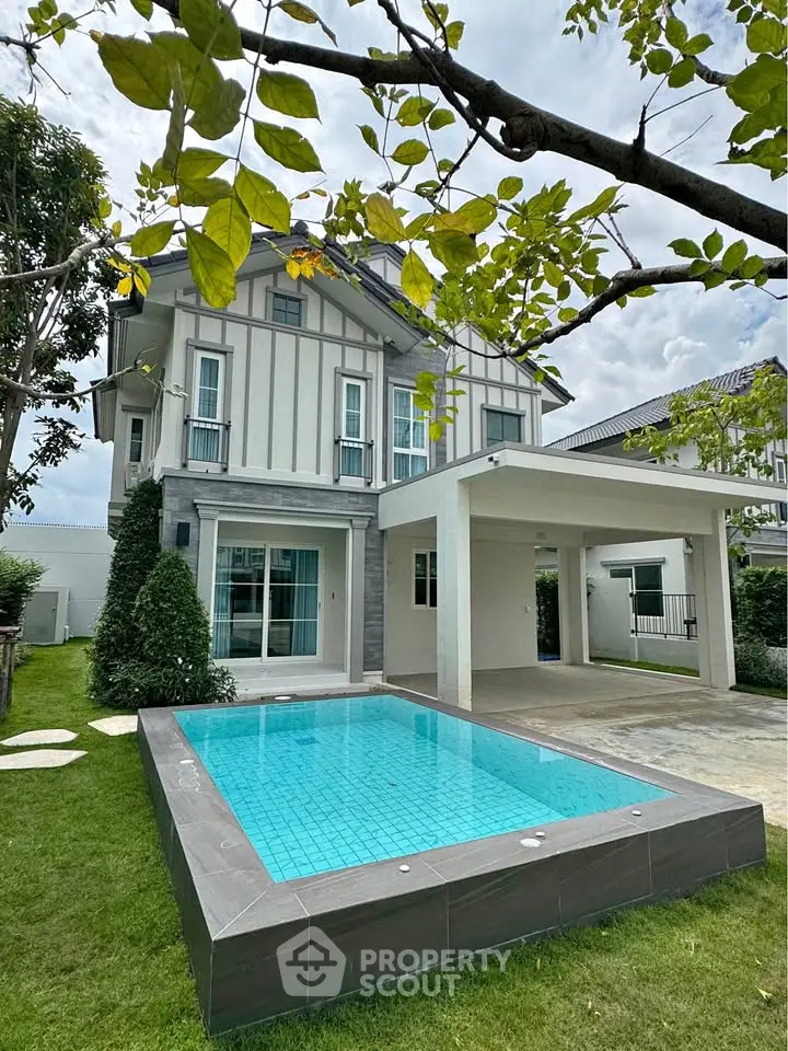 Stunning modern house with private pool and lush garden, perfect for luxury living.