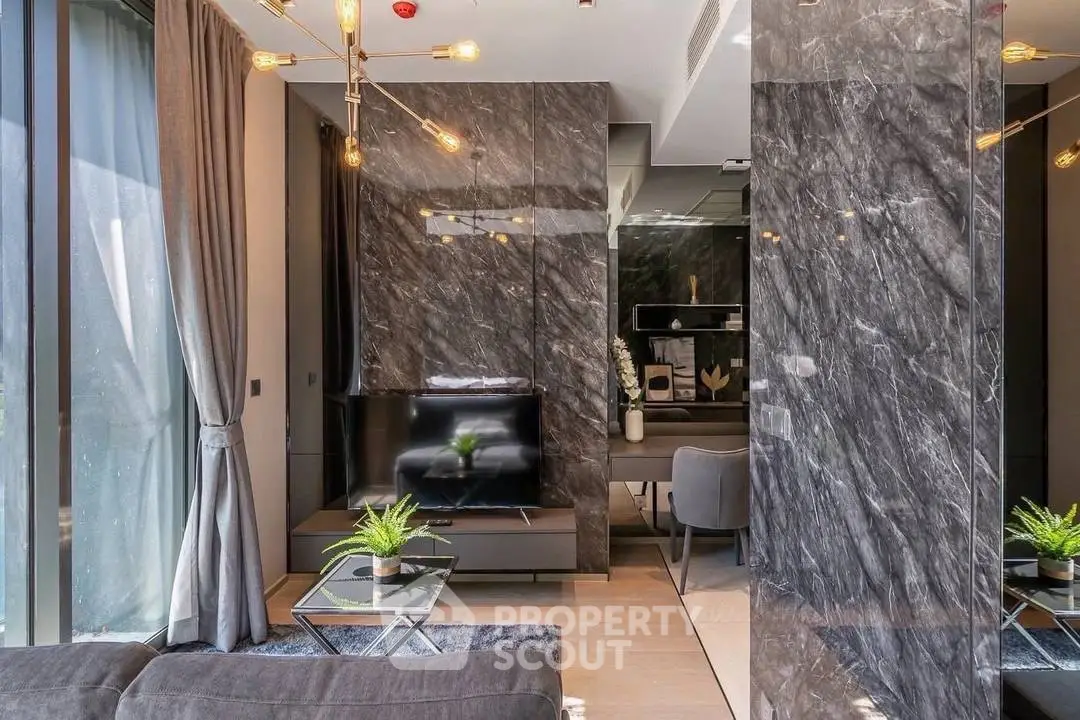 Luxurious modern living room with marble accents and stylish lighting