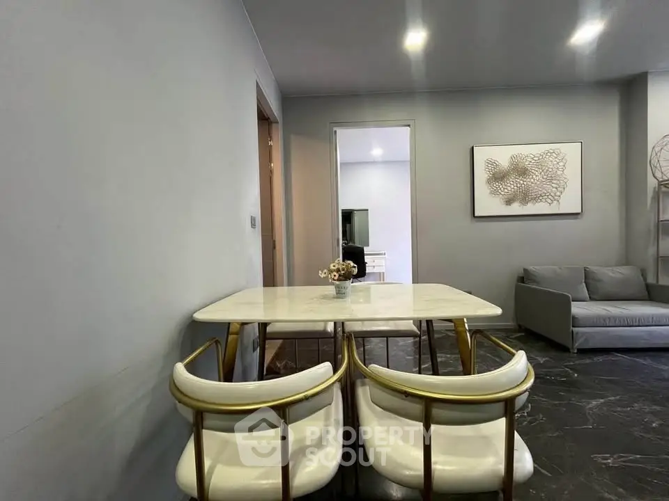Modern living room with elegant dining area and stylish decor