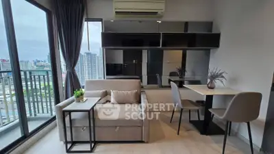 Modern living room with city view and stylish furniture in high-rise apartment