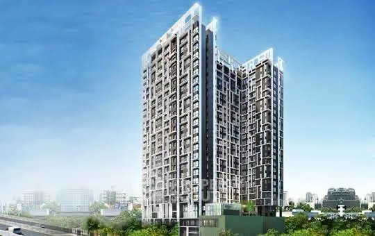 Modern high-rise building with sleek architecture and urban skyline view.