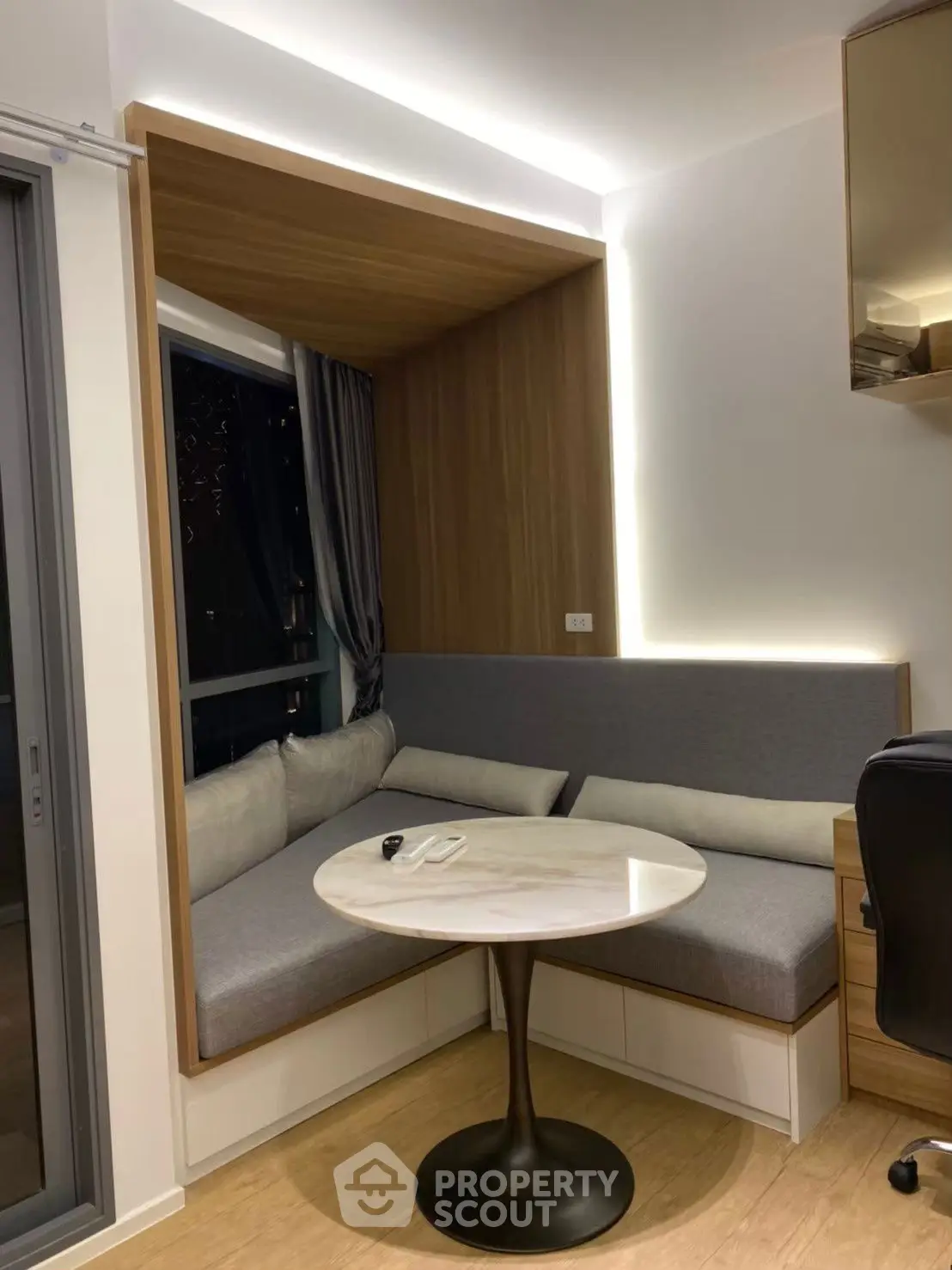 Modern cozy corner nook with stylish lighting and sleek furniture