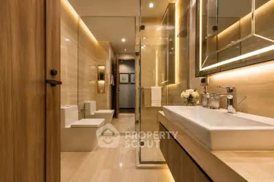 Luxurious modern bathroom with elegant wooden finishes and ambient lighting
