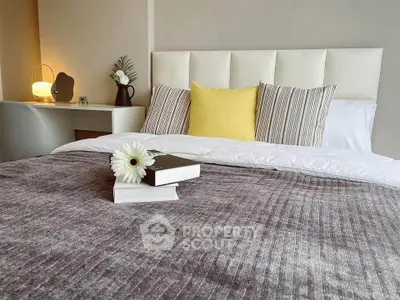Cozy bedroom with stylish decor and plush bedding, perfect for relaxation and comfort.