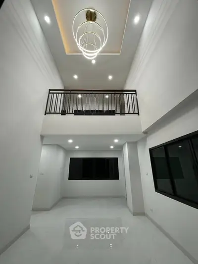 Stunning modern interior with high ceiling and elegant lighting