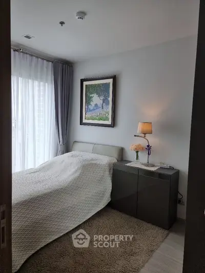 Cozy bedroom with elegant decor and natural light