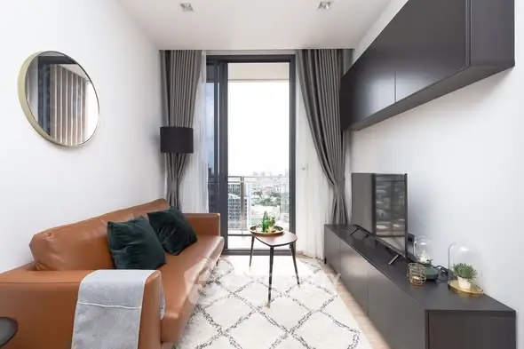 Stylish modern living room with city view and elegant decor