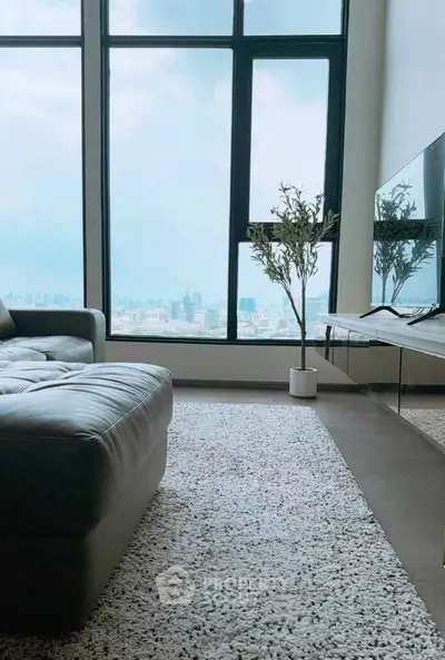 Luxurious living room with panoramic city view and modern decor