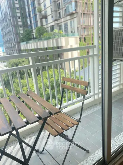 Charming balcony with wooden furniture and city view, perfect for relaxation and enjoying the outdoors.