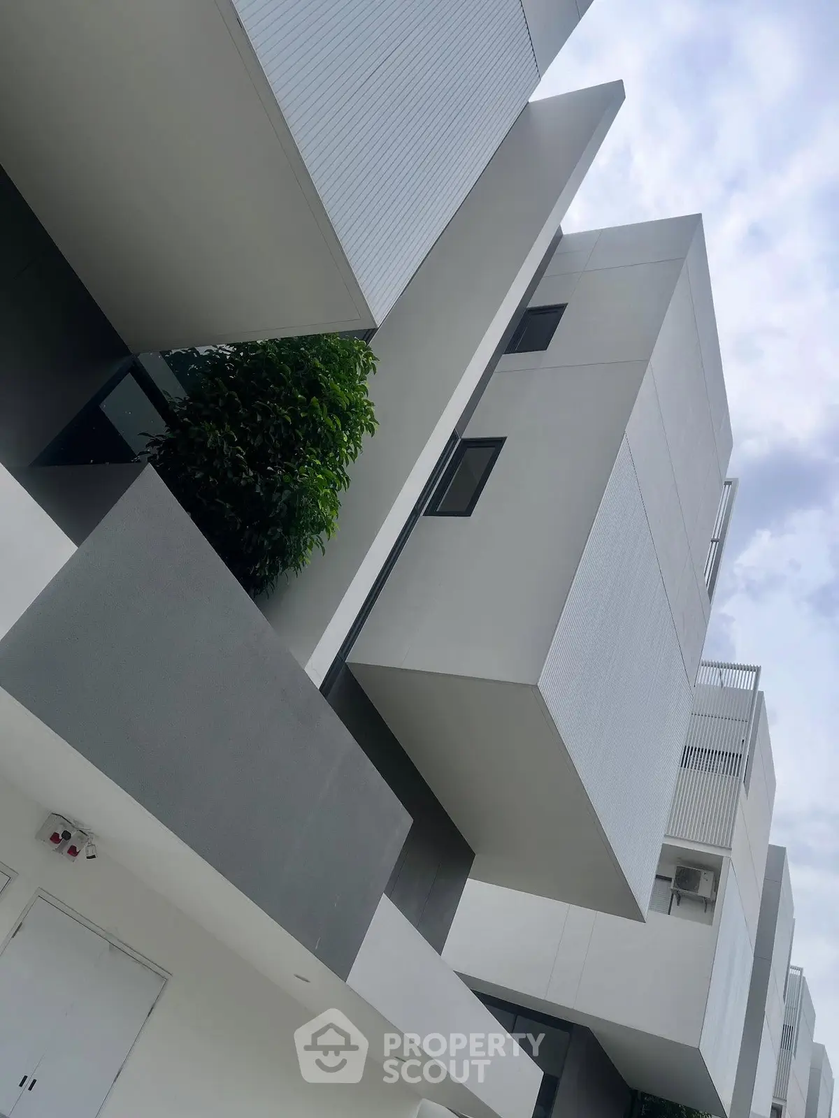 Modern architectural building with sleek design and geometric shapes