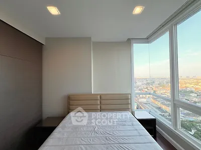 Modern bedroom with panoramic city view and sleek design