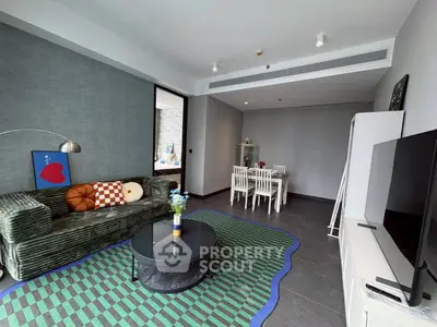 Modern living room with stylish decor and dining area