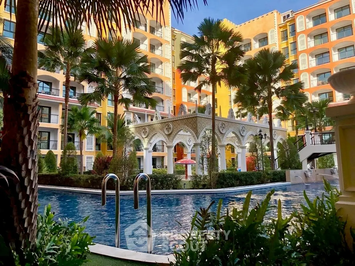 Luxurious apartment complex with stunning pool and lush landscaping