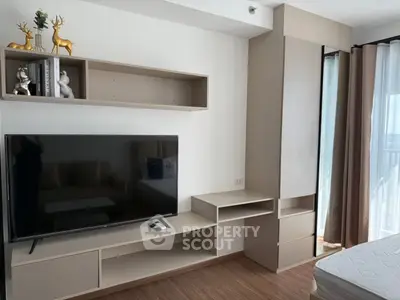 Modern living room with sleek TV unit and elegant decor