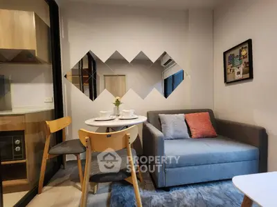 Chic modern living room with cozy sofa and stylish dining area in compact apartment