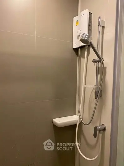 Modern bathroom shower with sleek design and water heater