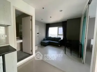 Modern apartment interior with cozy living room and natural light