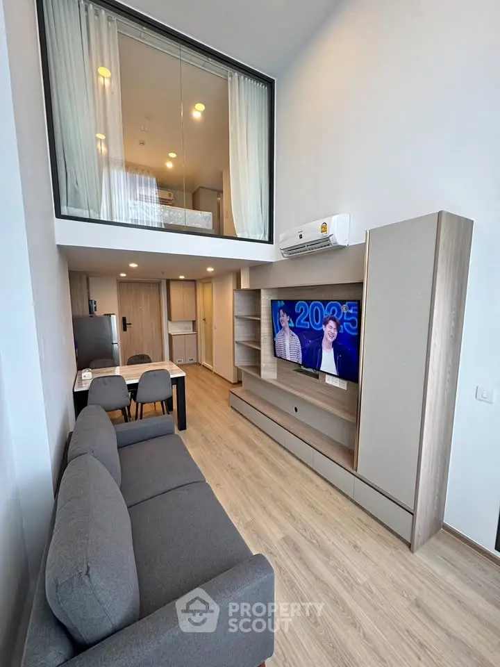 Modern duplex apartment with stylish living room and mezzanine bedroom