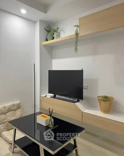 Modern living room with sleek TV setup and stylish decor