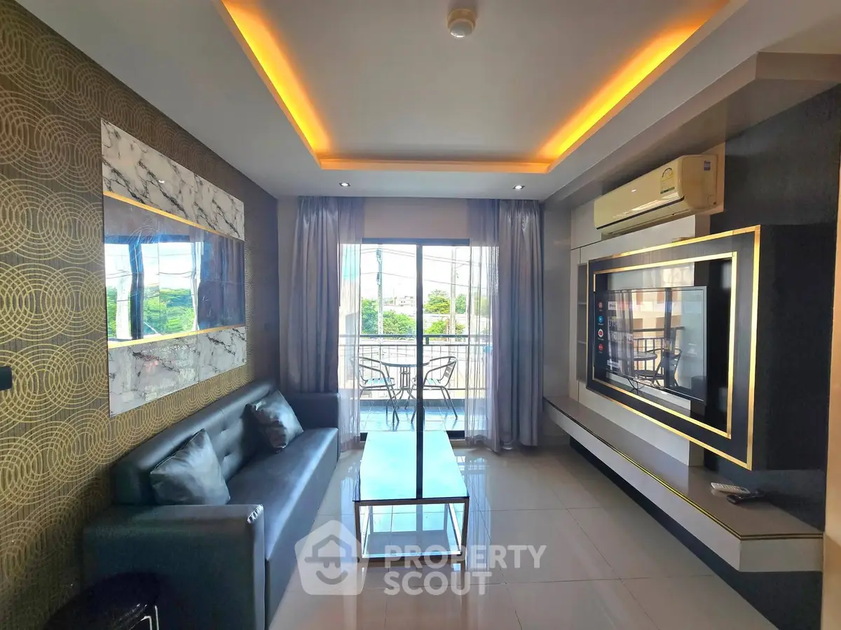 Modern living room with stylish decor and balcony view, featuring sleek furniture and ambient lighting.