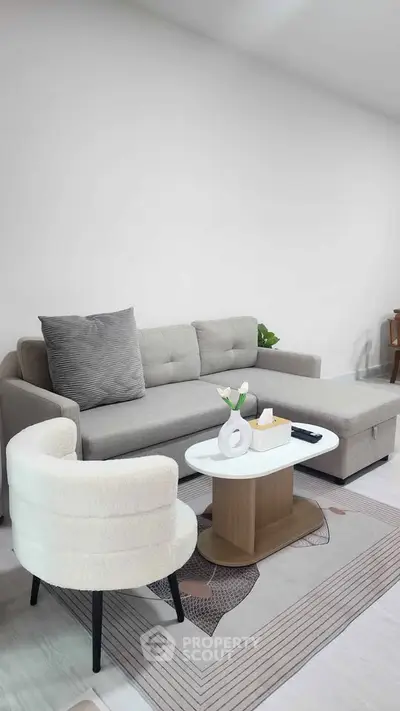Modern living room with stylish furniture and elegant decor