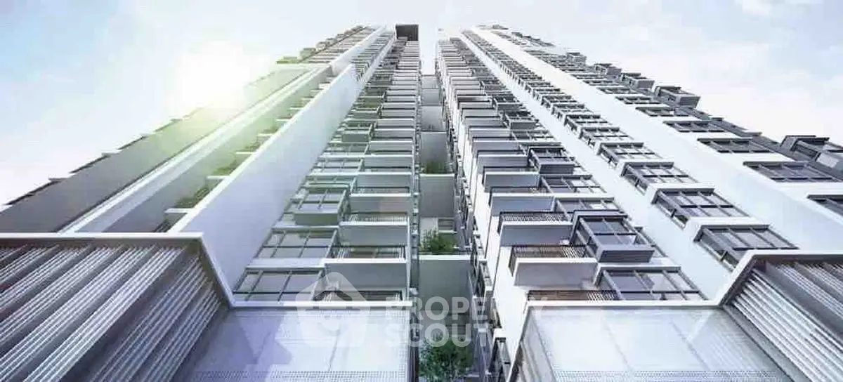 Stunning modern high-rise building with sleek architectural design and expansive balconies.