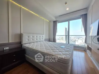 Modern bedroom with city view and stylish decor