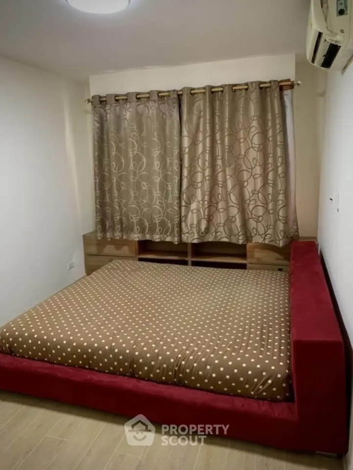 Cozy bedroom with modern decor and stylish curtains