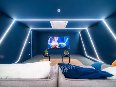 Modern home theater with sleek design and ambient lighting