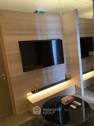 Modern living room with sleek TV setup and stylish decor