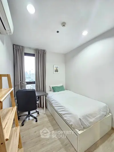 Cozy minimalist bedroom with city view, perfect for urban living.