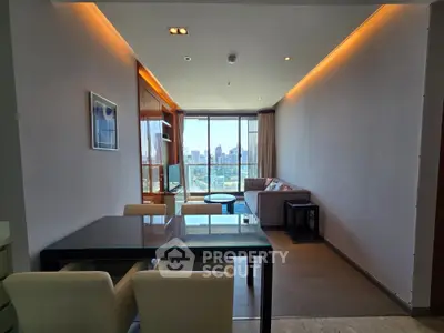 Modern living room with city view, featuring sleek furniture and ambient lighting.