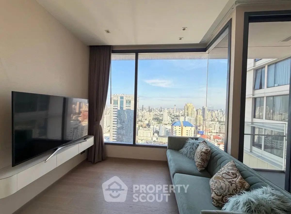 Luxurious living room with panoramic city view and modern decor