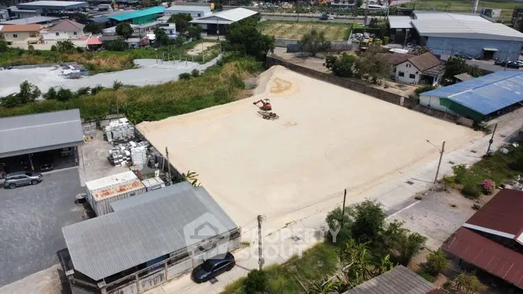 Expansive vacant land plot ideal for development in a thriving industrial area.