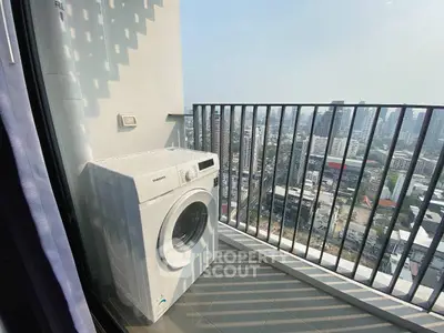 High-rise balcony with city view and washing machine, perfect for urban living.