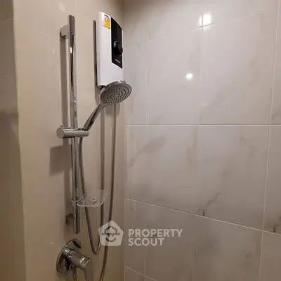 Modern bathroom shower with sleek design and water heater