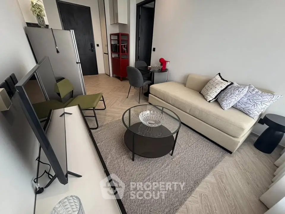 Modern living room with stylish furniture and open layout in a contemporary apartment.