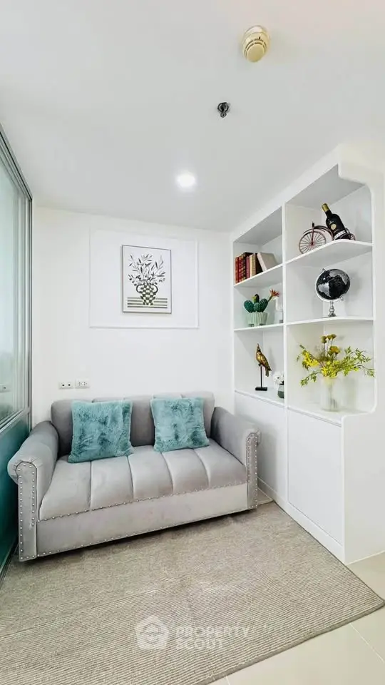 Chic modern living room with cozy sofa and stylish shelving unit