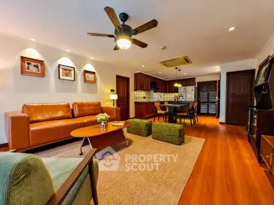 Spacious living room with modern furniture and open kitchen layout