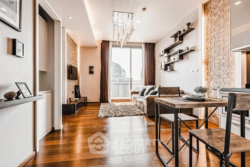 Modern living room with stylish decor and city view from large window.