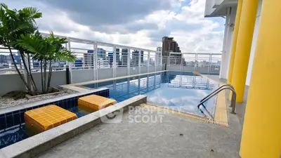 Stunning rooftop pool with city skyline views and modern design.