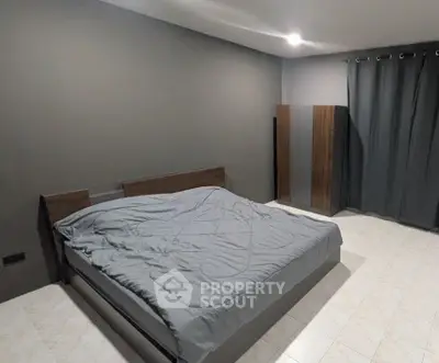 Modern bedroom with minimalist design and cozy ambiance