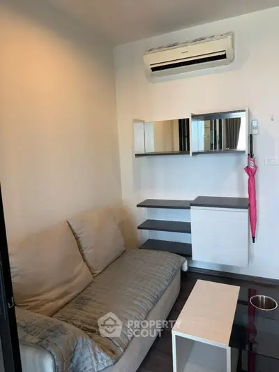 Cozy living room with modern air conditioning and stylish furniture