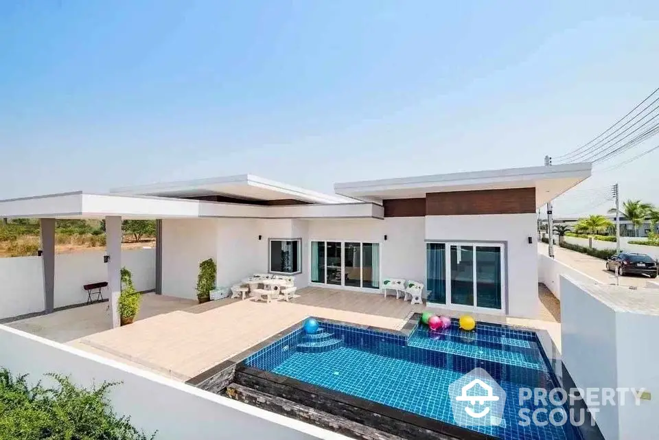 Modern villa with private pool and spacious terrace in a serene neighborhood.