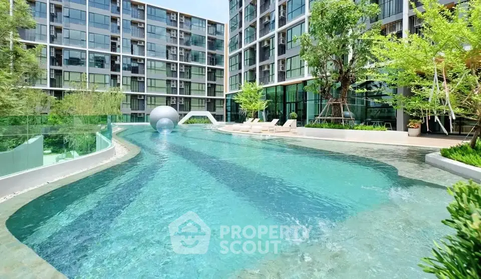 Luxurious condominium with stunning pool and modern architecture
