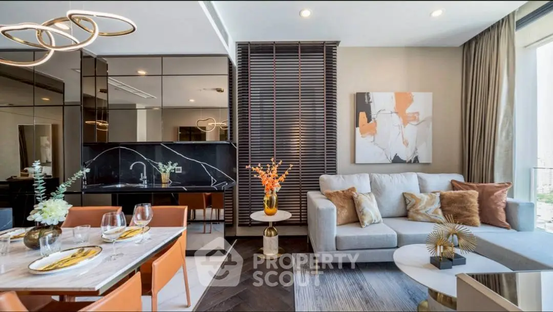 Luxurious modern living room with elegant decor and open kitchen layout.