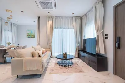 Luxurious modern living room with elegant decor and natural light