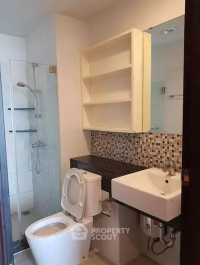 Modern bathroom with sleek fixtures and stylish tile design
