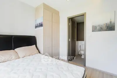 Modern bedroom with ensuite bathroom and stylish decor