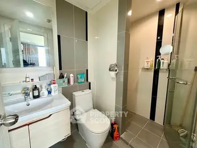 Modern bathroom with sleek design and glass shower enclosure